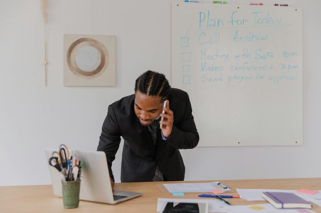 A phone turned face down next to a simple practice checklist on a desk