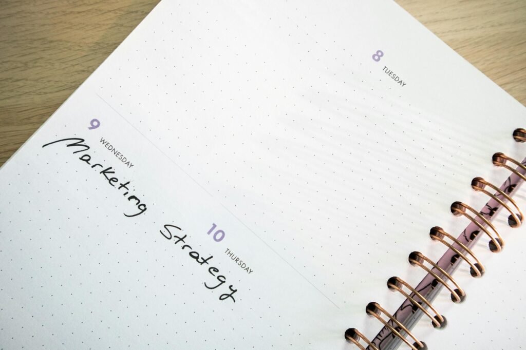 A desk calendar and notes used to schedule short practice sessions.