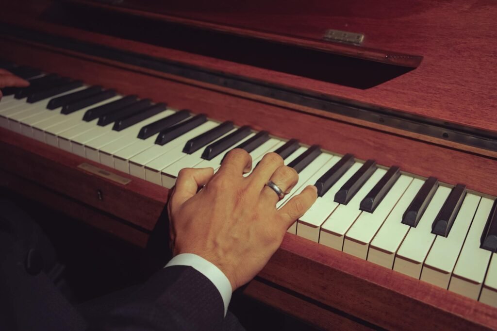 Close-up of hands practicing a passage slowly on an instrument