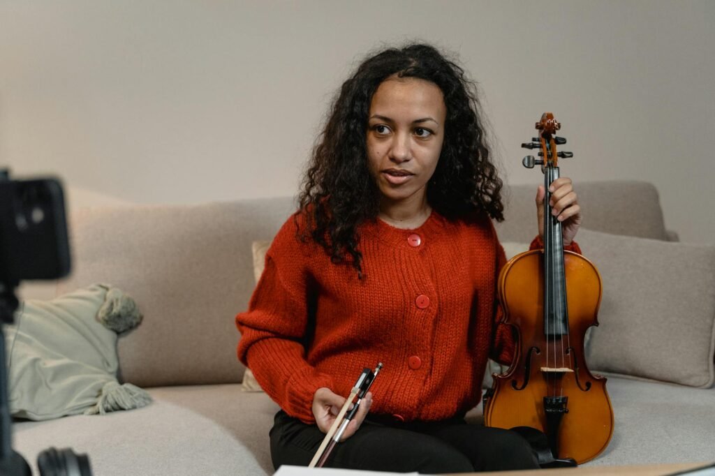 An adult musician practicing at home in a calm everyday setting