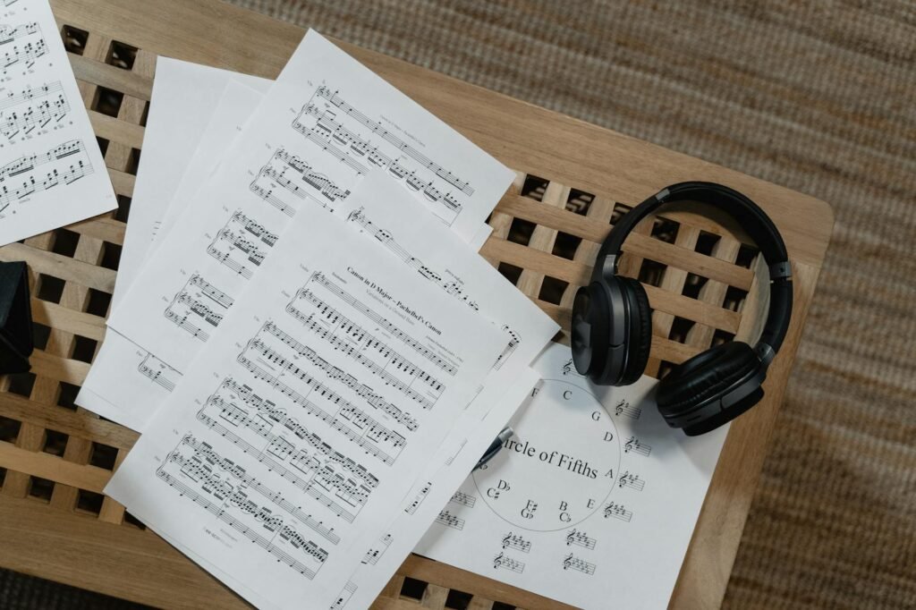 Close-up of sheet music with one measure circled and practice notes written in pencil