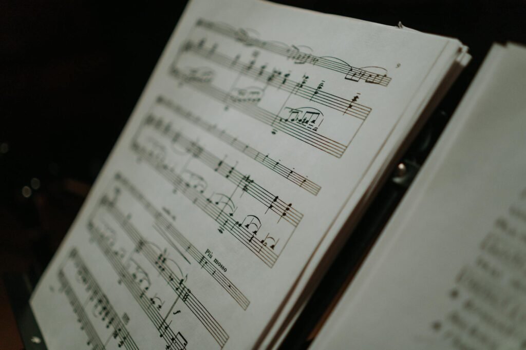 A score on a music stand marked with sticky notes and multiple entry points.
