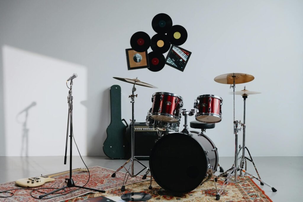 A small recording device near a music stand in a practice space